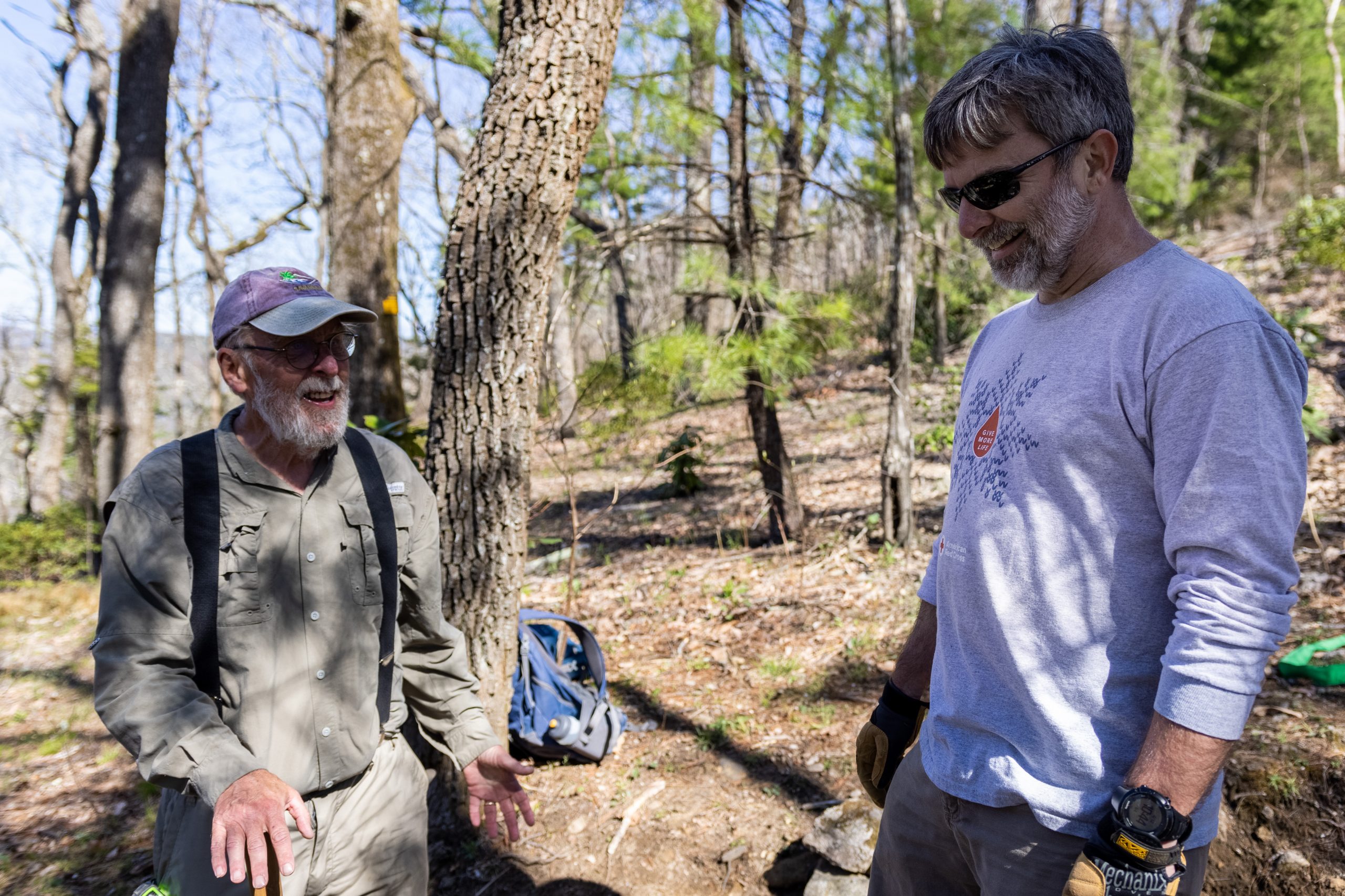 Tim laughing with a volunteer