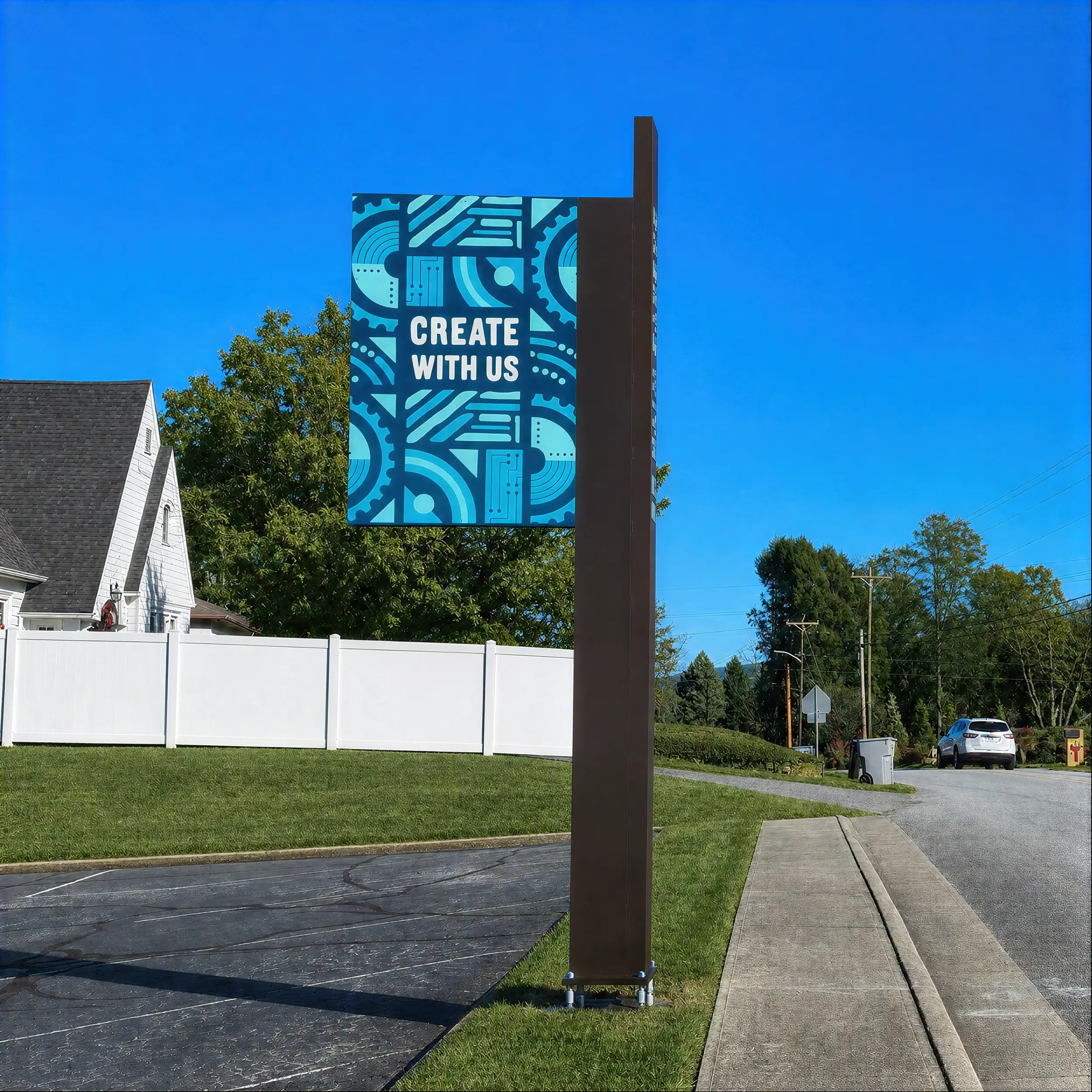 Lenoir branded vehicular signage by the side of the road