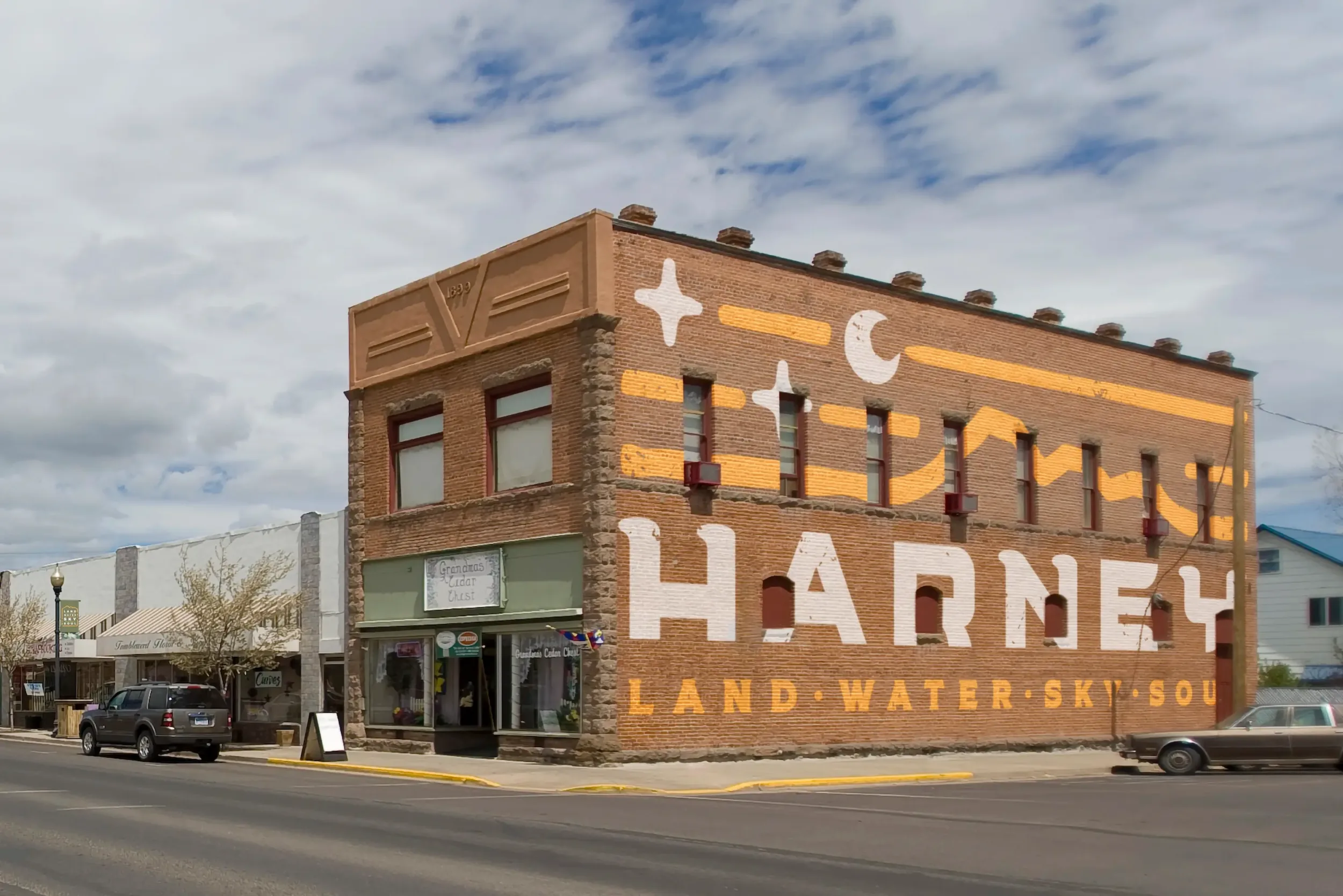 A render of a Harney branded mural on a building
