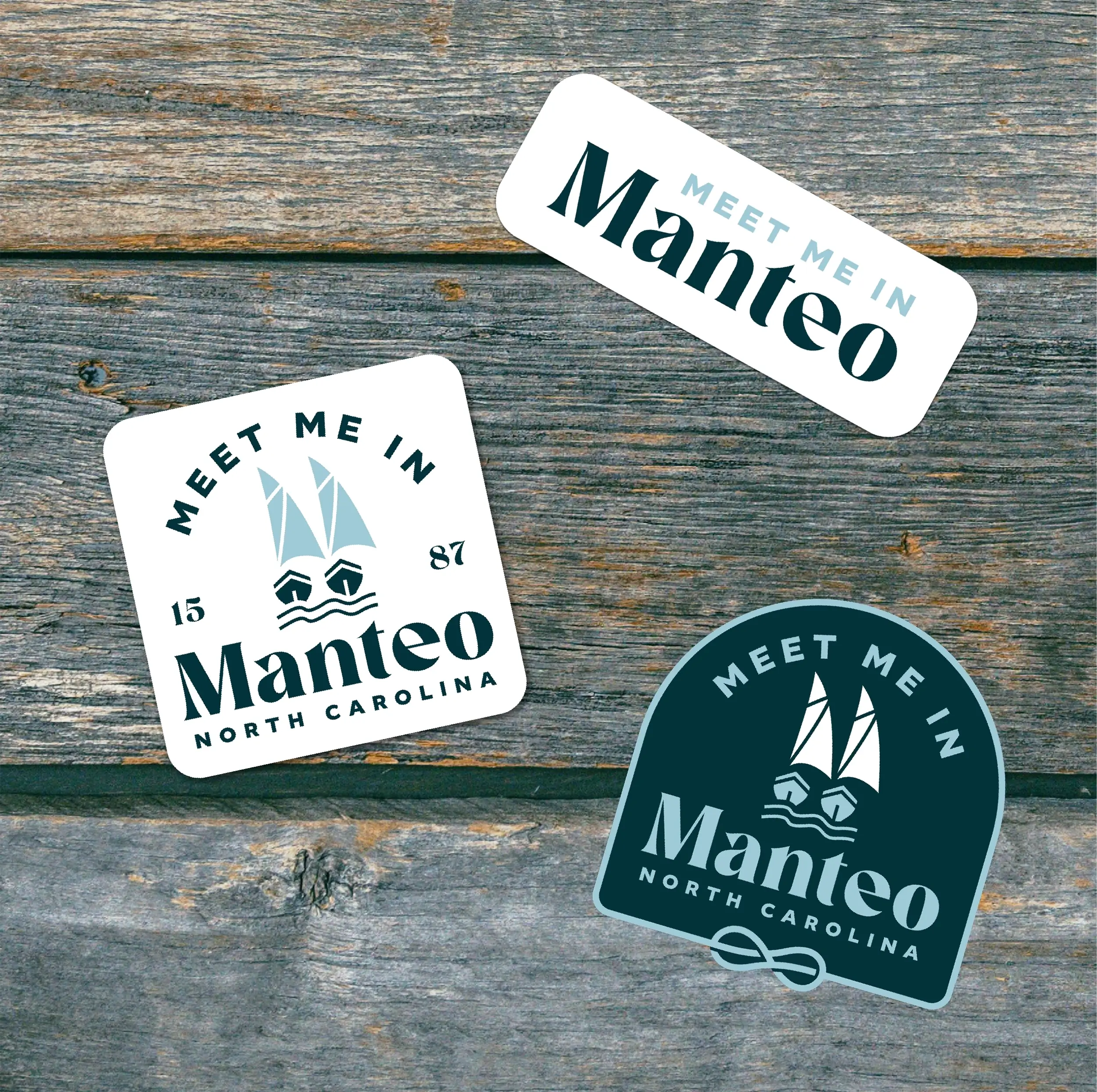 Manteo brand stickers on the board-walk.