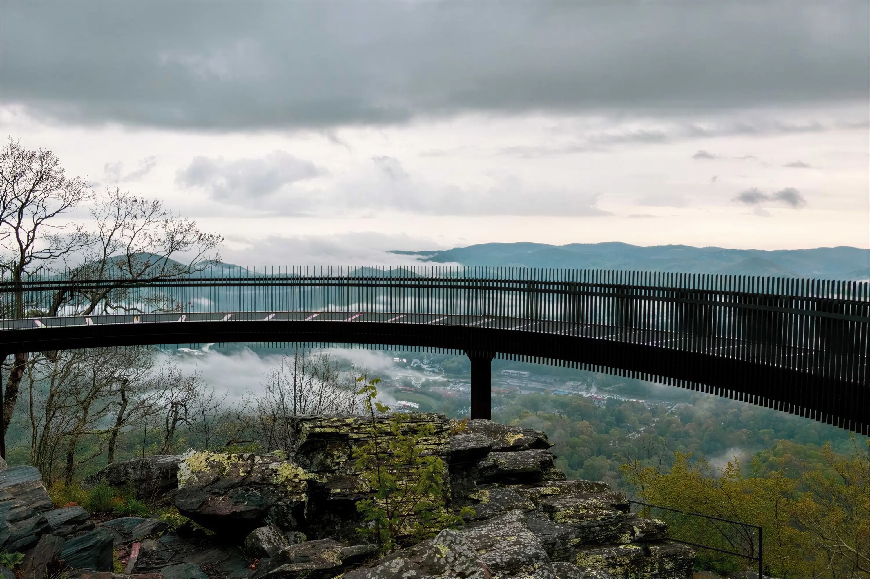 A landscape view of Boone and Appalachian State University from the finished Howard Knob overlook platform