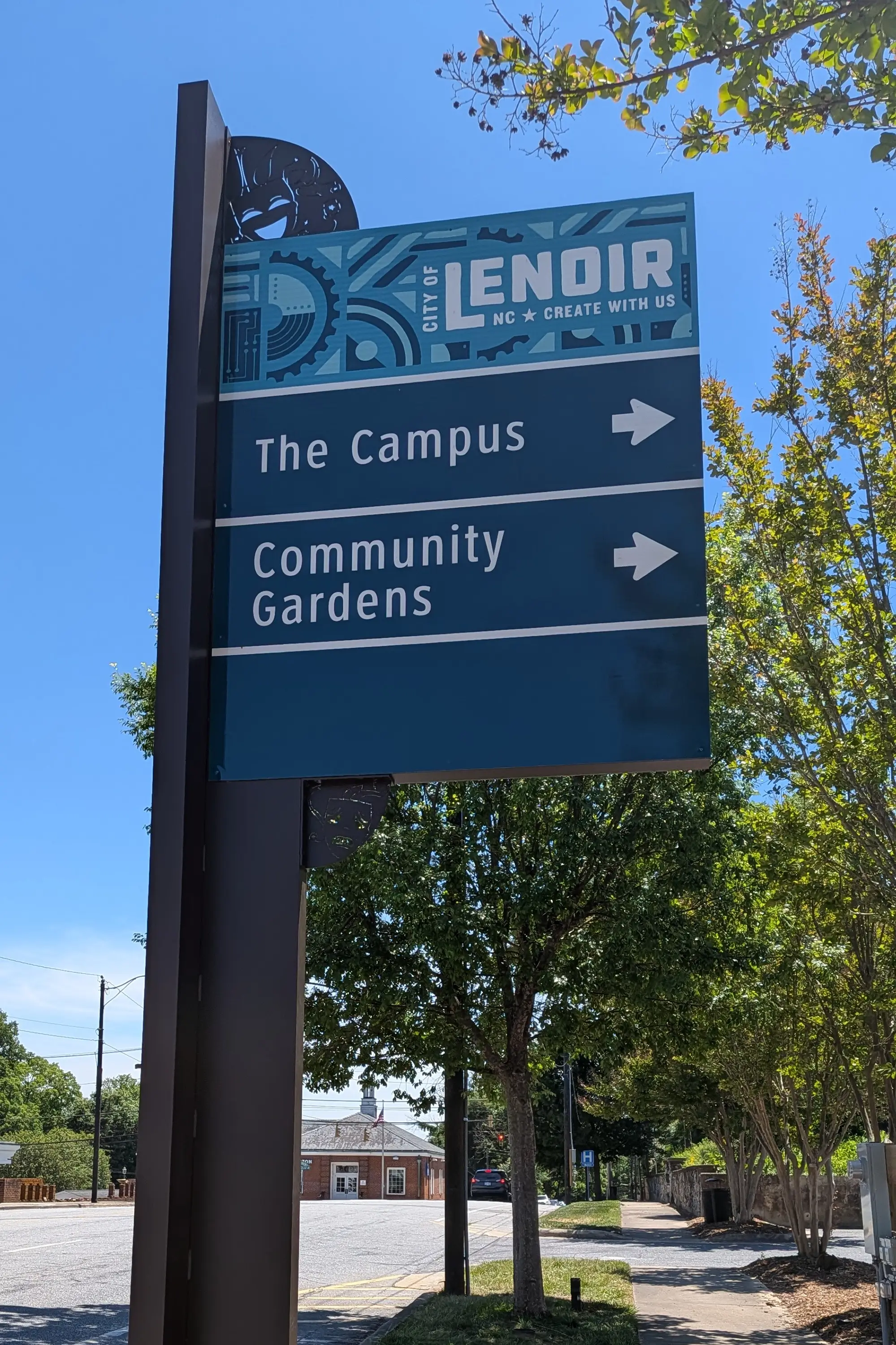 Directional signage pointing to campus