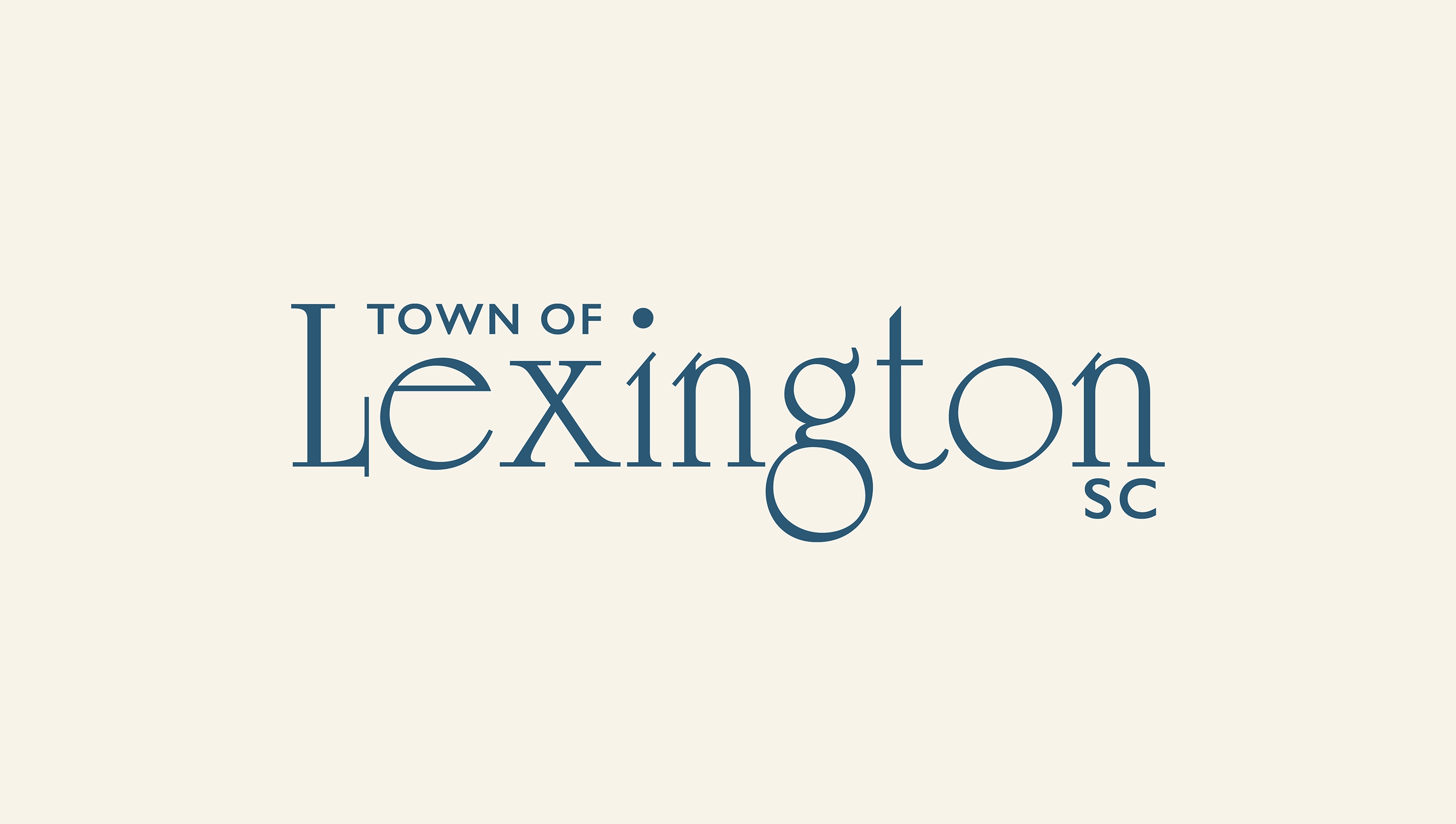 The Lexington, SC logo on a solid tan background