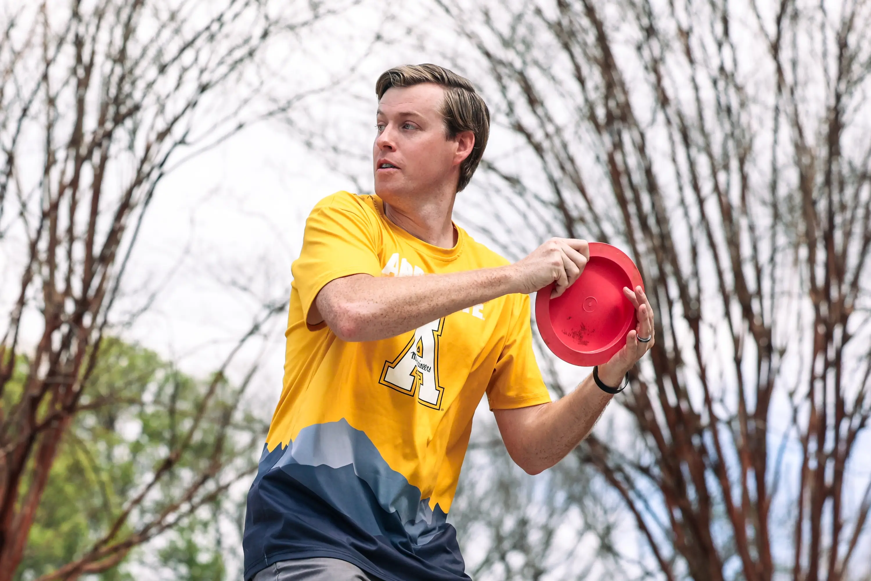 A man about to throw a disc