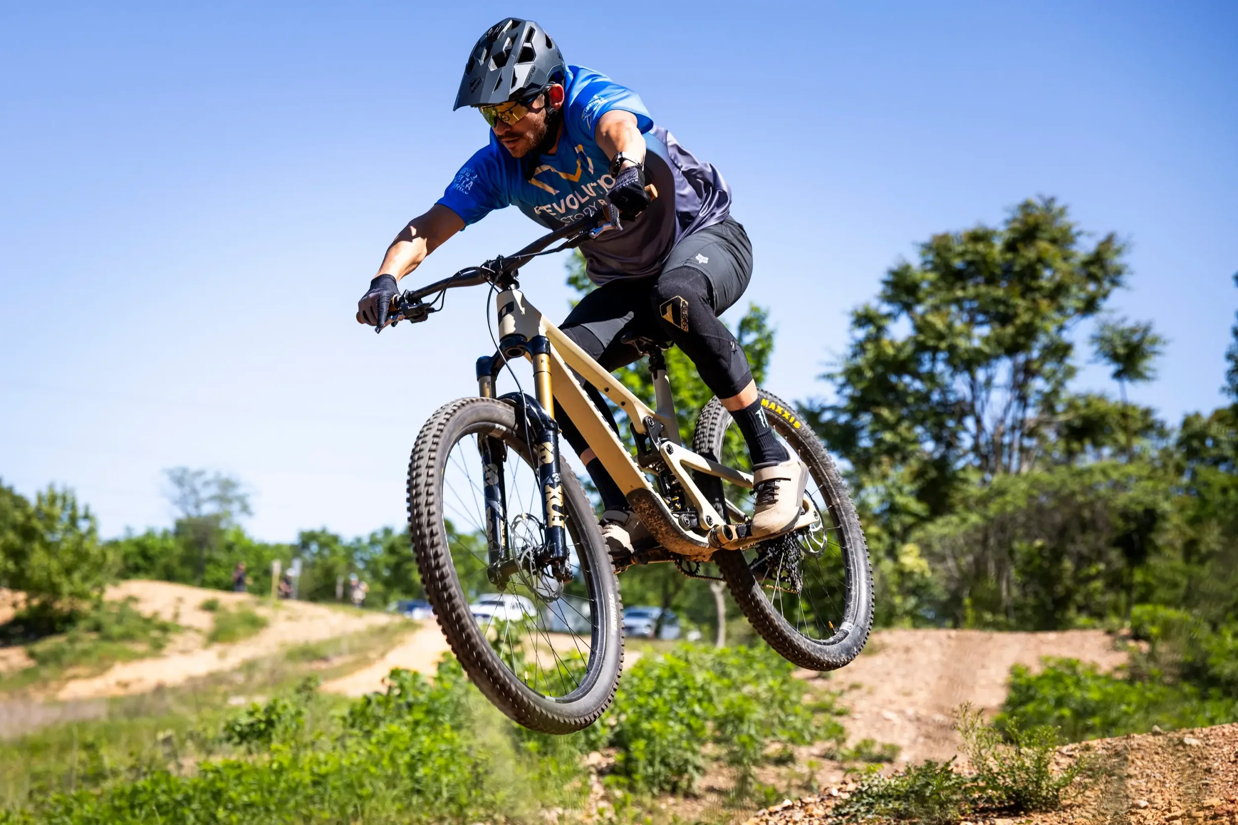 A man on a bike in the air