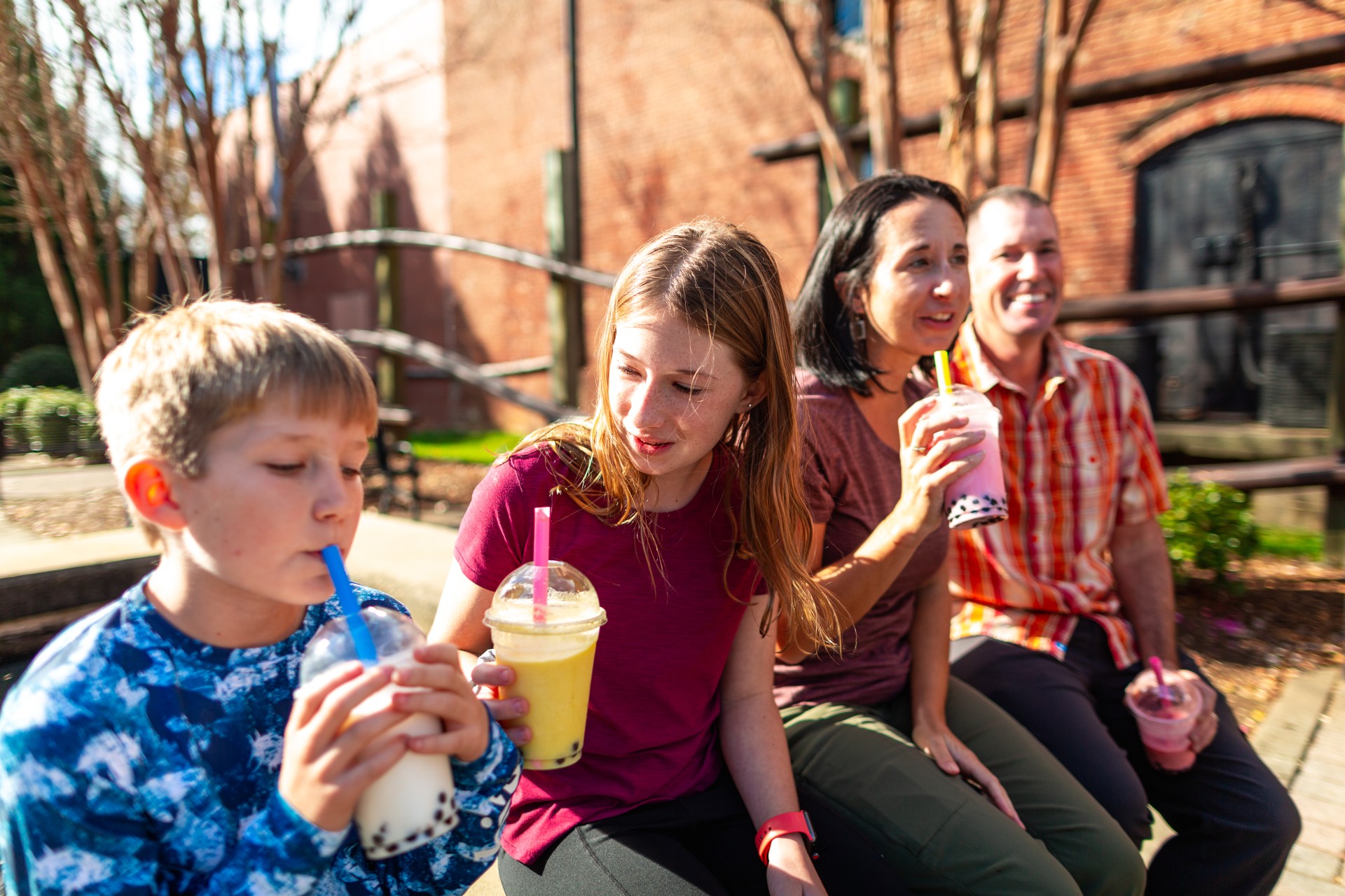 Kids drinking boba tea.