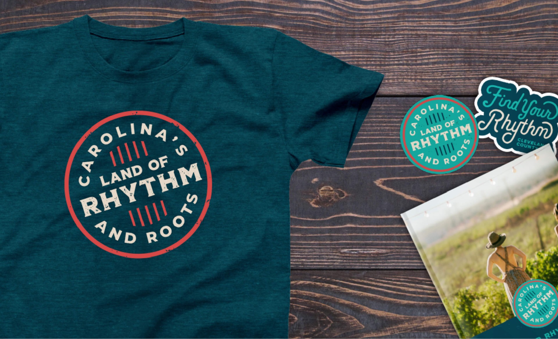 Branded mockups of Land of Rhythm merchandise, including t-shirts, stickers, and a magazine cover.