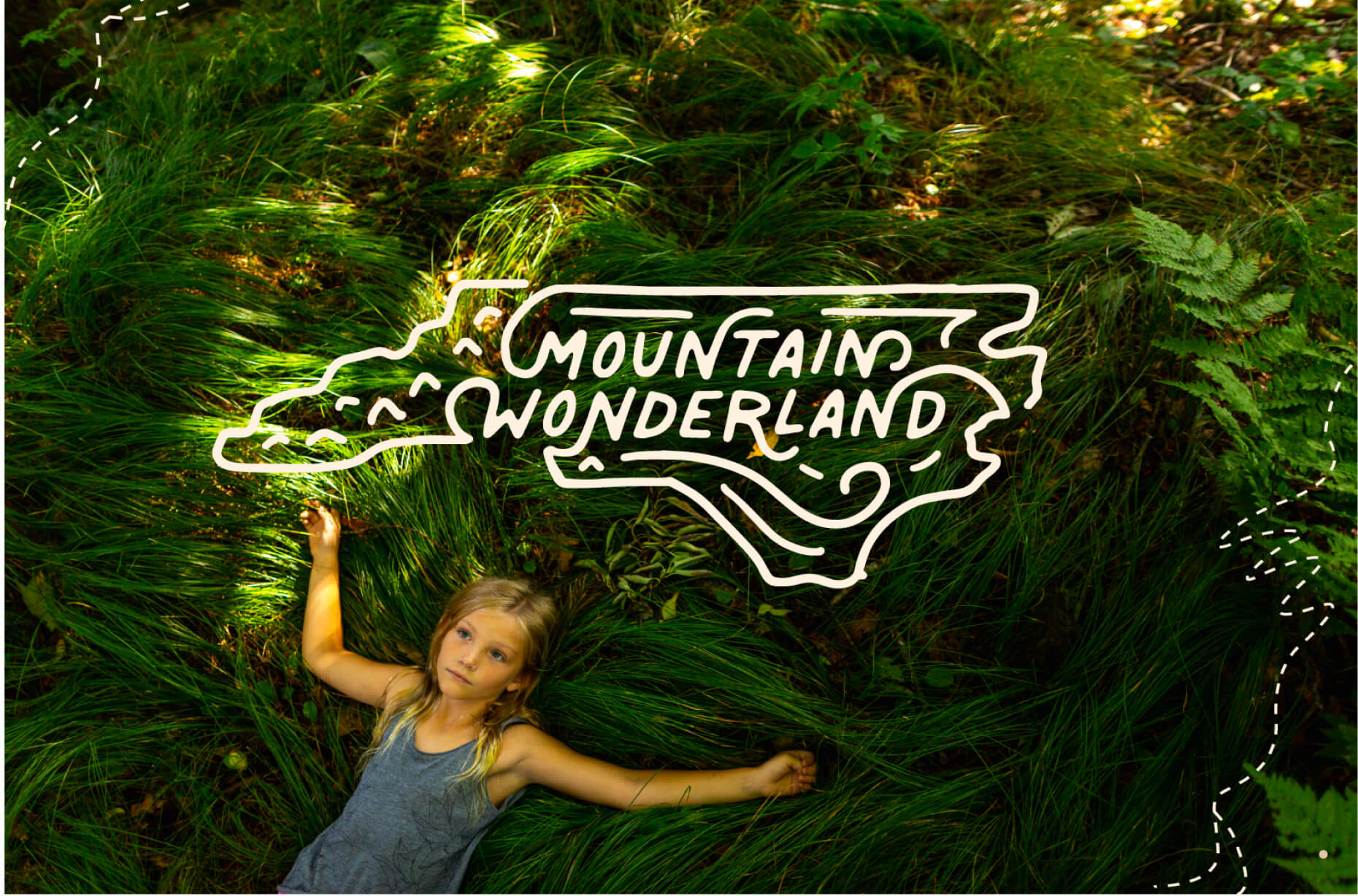 Mountain Wonderland girl in grass.